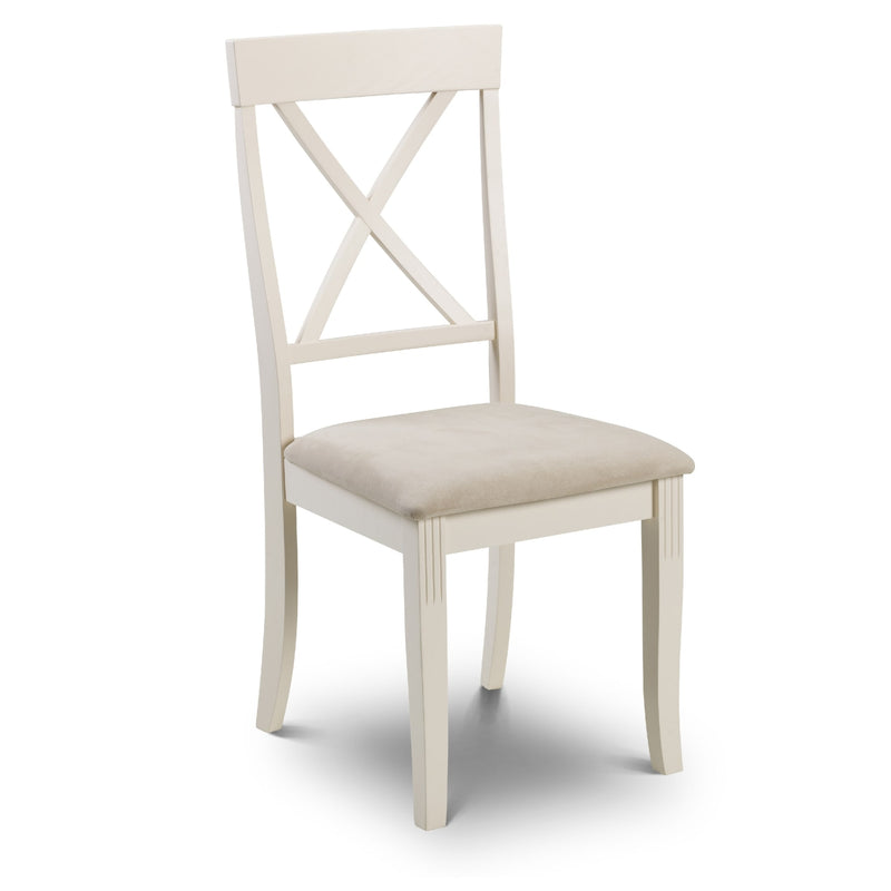 White chair with beige cushion on a white background