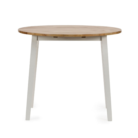 Round wooden table with white legs on a white background