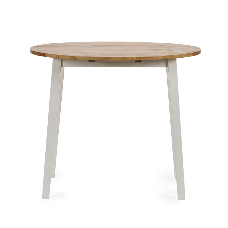 Round wooden table with white legs on a white background