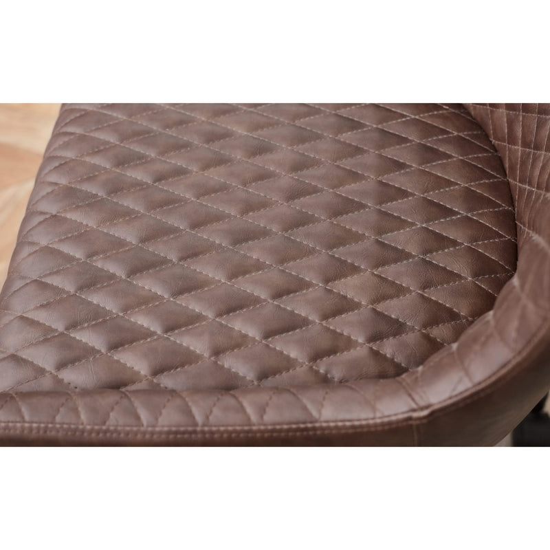 Brown quilted leather seat cover on a vehicle seat