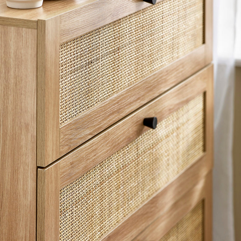 Wooden cabinet with woven design on doors and drawers