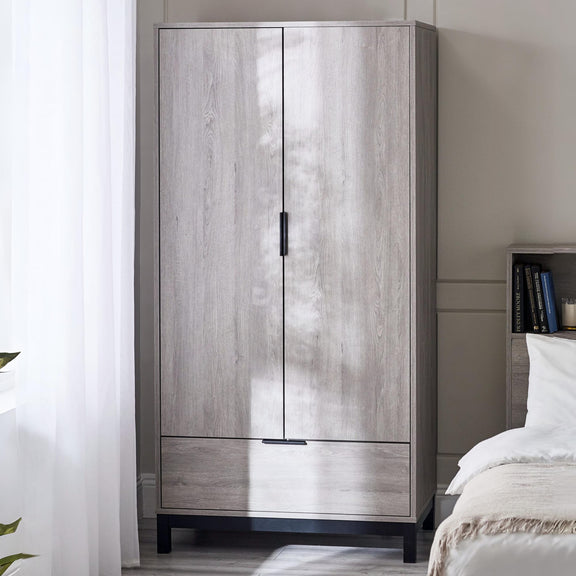 Wooden wardrobe with two doors in a bedroom setting