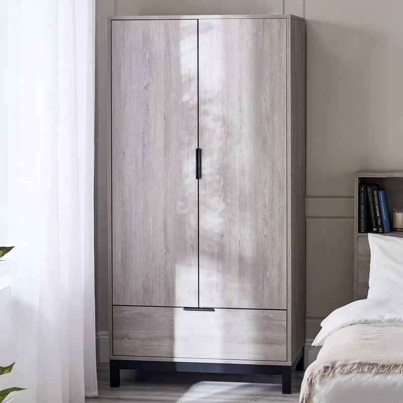 Wooden wardrobe with two doors in a bedroom setting
