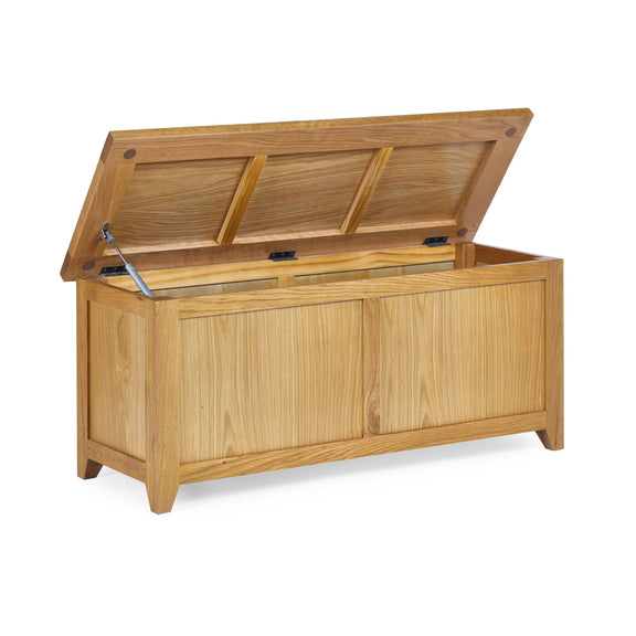 Wooden storage chest with open lid on a white background