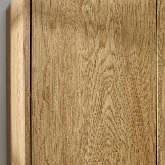 Close-up of a wooden panel with a natural finish