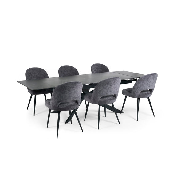Black dining table with six gray chairs on a white background
