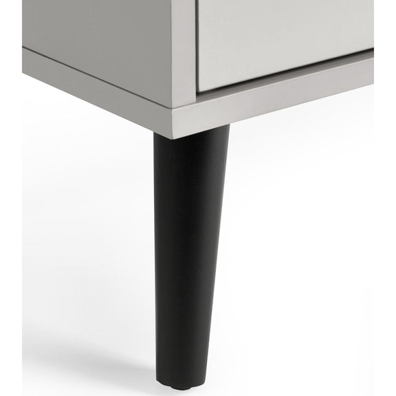 Close-up of a furniture leg on a white background