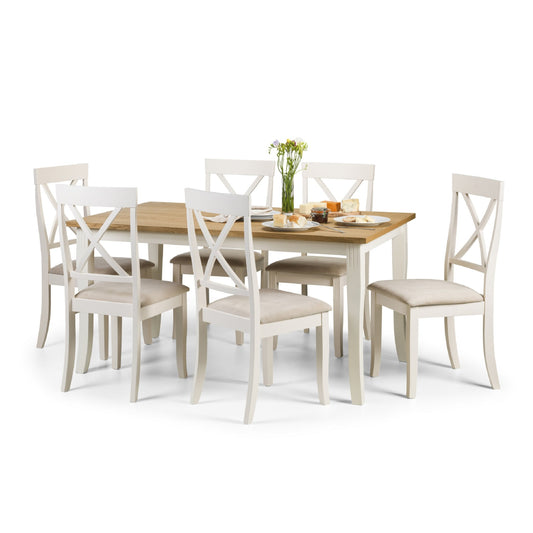 Dining table set with six chairs on a white background
