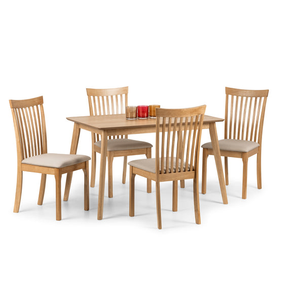 Wooden dining set with table and four chairs on a white background