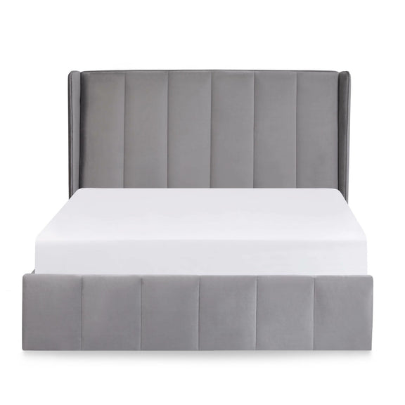 Gray upholstered bed frame with a white mattress on a white background