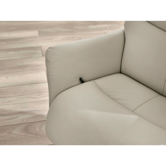 Beige leather sofa corner on a wooden floor