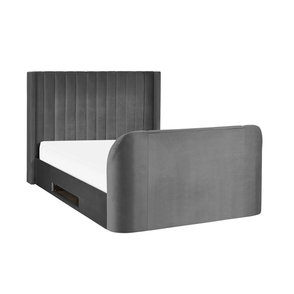 Gray upholstered bed frame with a white mattress on a white background