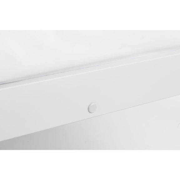 Close-up of a white cabinet with a round handle on a white background