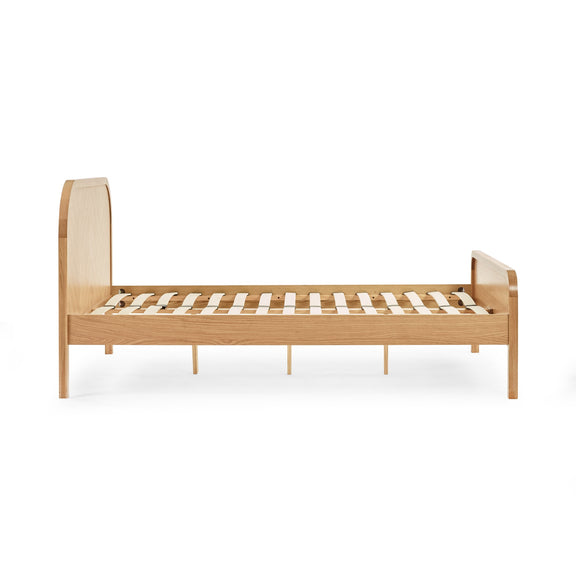 Wooden bed frame on a white background