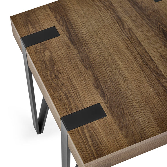 Wooden desk with black metal brackets on a white background