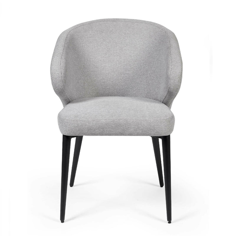 Gray upholstered chair with black legs on a white background