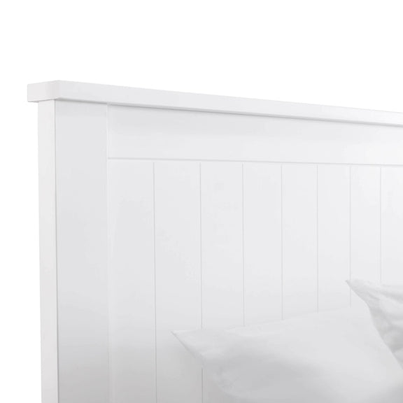White wooden headboard with a subtle texture on a white background