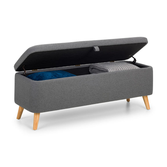 Gray storage bench with open lid showing blue and gray blankets on a white background