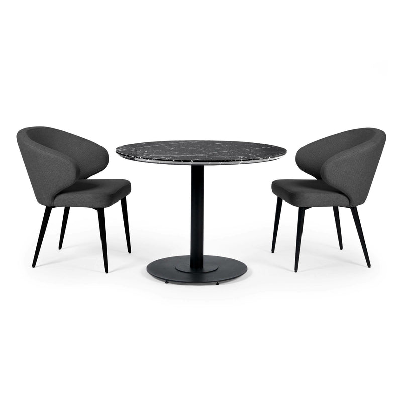 Black round table with two modern chairs on a white background