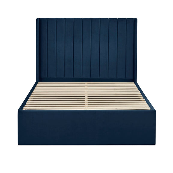 Navy blue upholstered bed frame with wooden slats on a white background