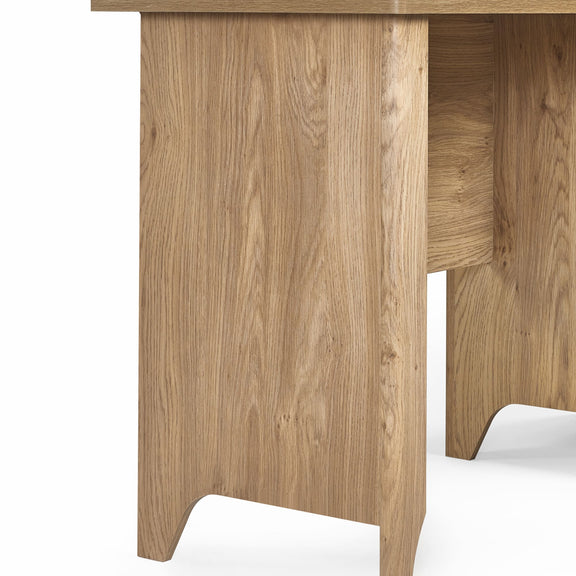 Wooden desk with a light brown finish on a white background