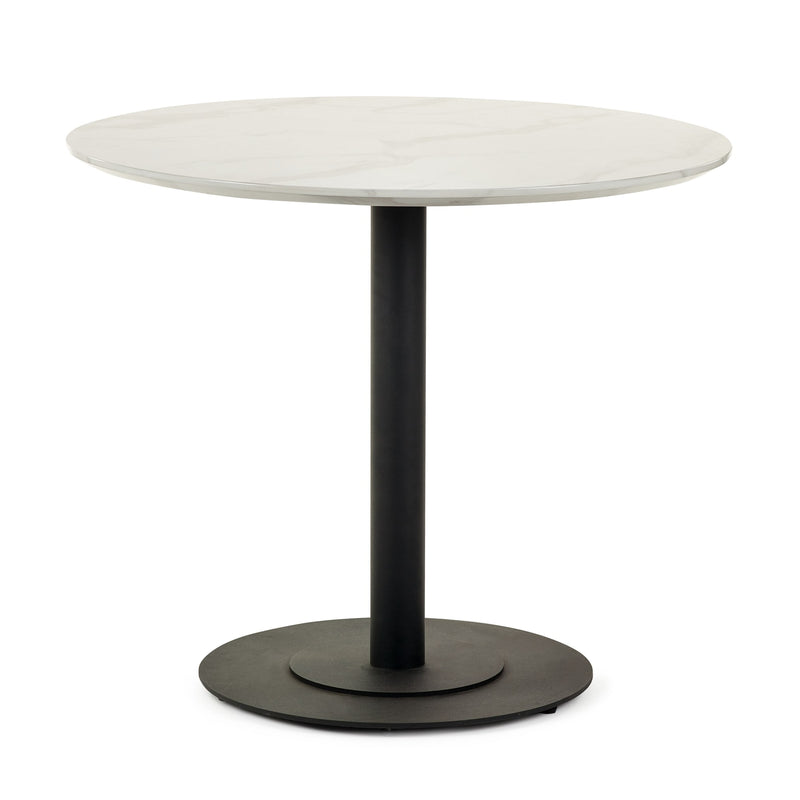 Round table with white top and black base on a white background