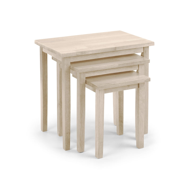 Set of three light wood nesting tables on a white background