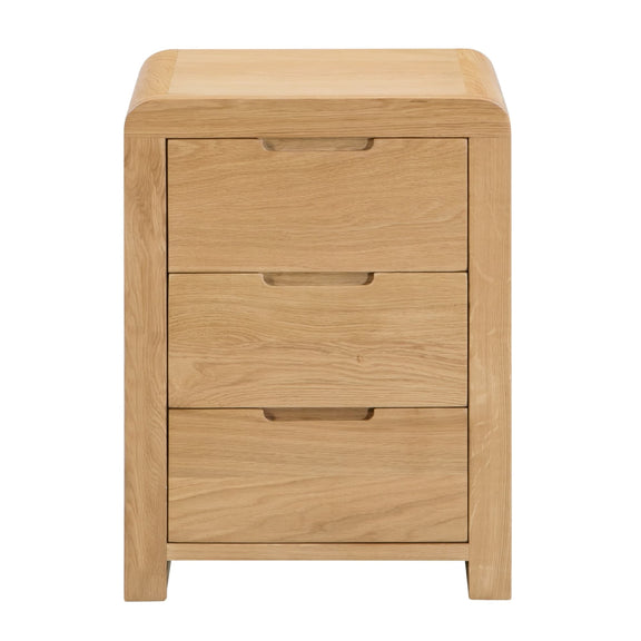 Wooden nightstand with three drawers on a white background