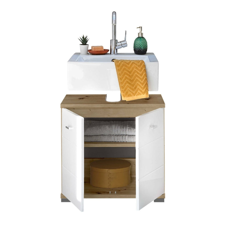 Bathroom vanity with sink, cabinet, and decorative items on a white background