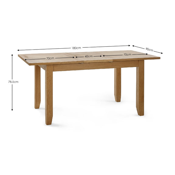 Wooden dining table with dimensions marked on a white background