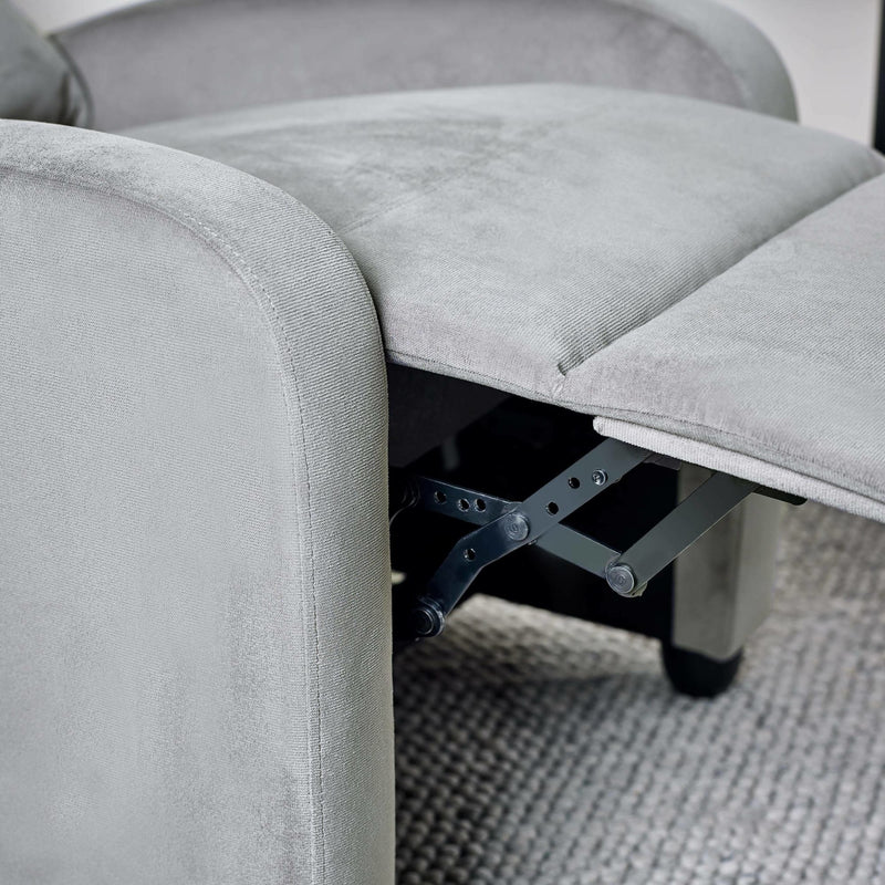 Gray upholstered chair with a focus on the mechanism under the seat.
