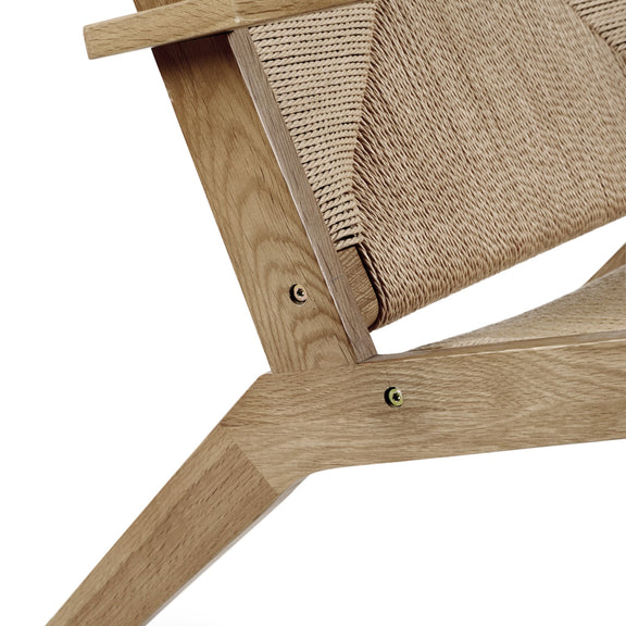 Wooden cat tree with sisal-wrapped platform on a white background