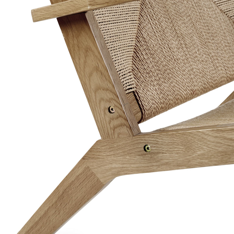 Wooden cat tree with sisal-wrapped platform on a white background