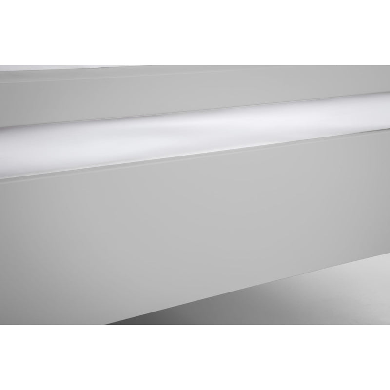 Close-up of a white LED light strip on a gray background