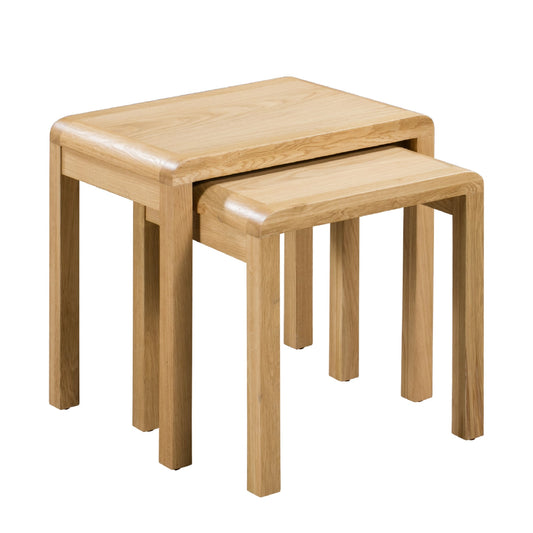 Set of two wooden nesting tables on a white background