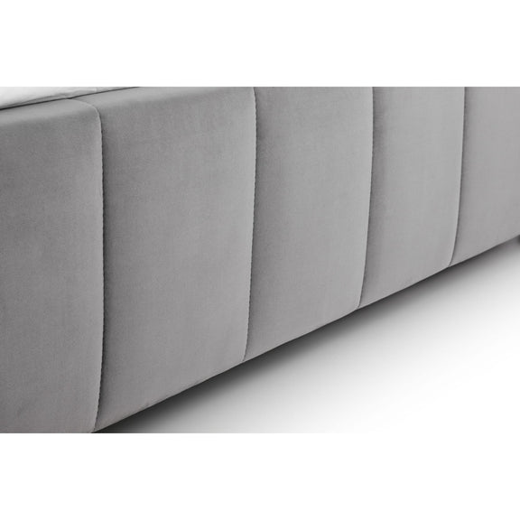 Gray upholstered headboard on a white background