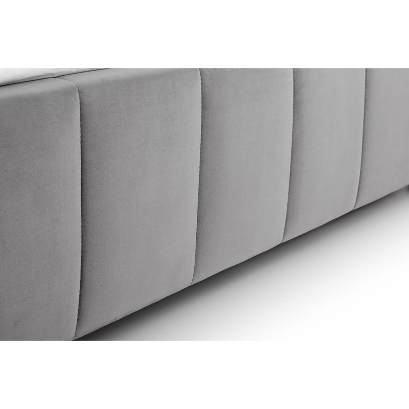 Gray upholstered headboard on a white background
