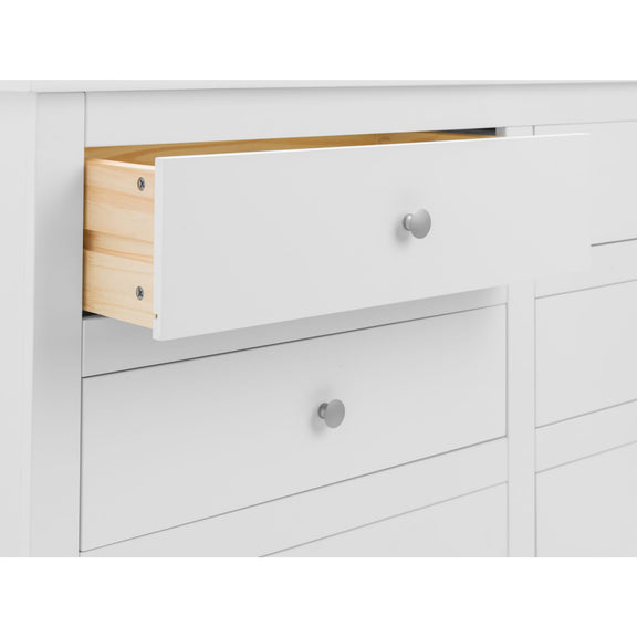 White dresser with open drawer revealing wooden interior