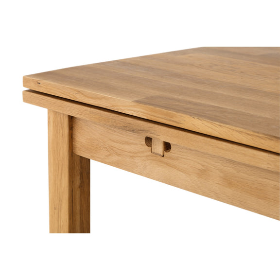 Wooden table with a visible joint on a white background