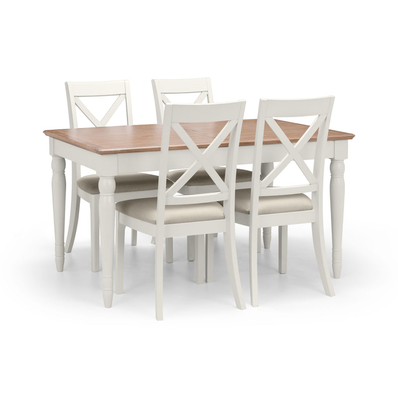Dining table set with four chairs on a white background