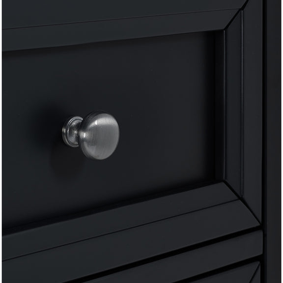 Black cabinet with a glass knob on a black background