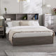 Bedroom with a wooden bed frame, white bedding, and nightstands.