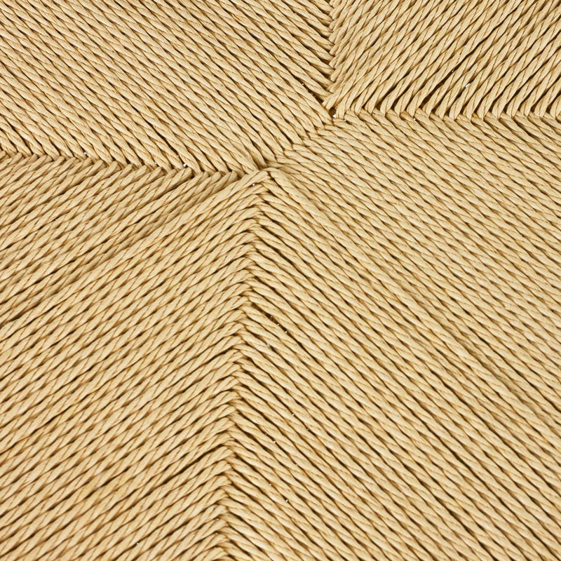 Close-up of a woven pattern with interlocking lines in a beige color.