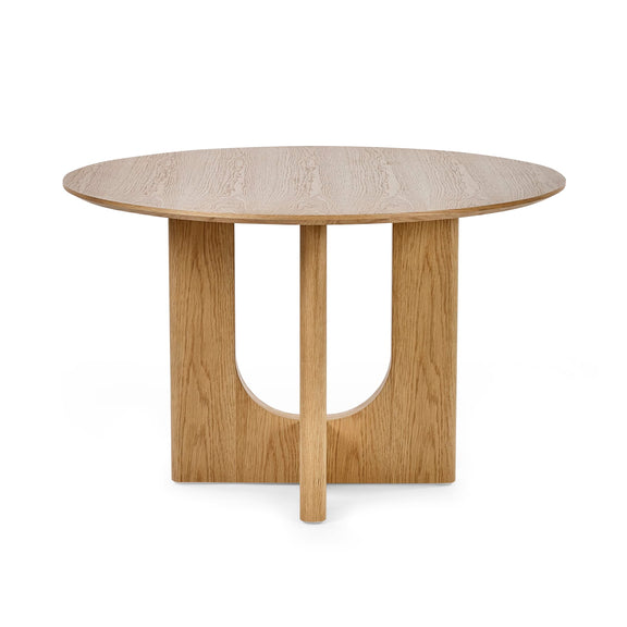 Round wooden table with a light finish on a white background