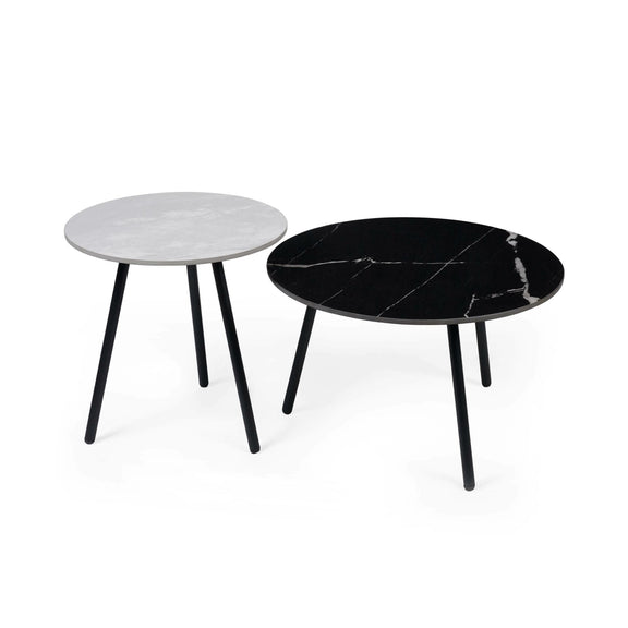 Two round marble coffee tables, one black and one gray, on a white background.