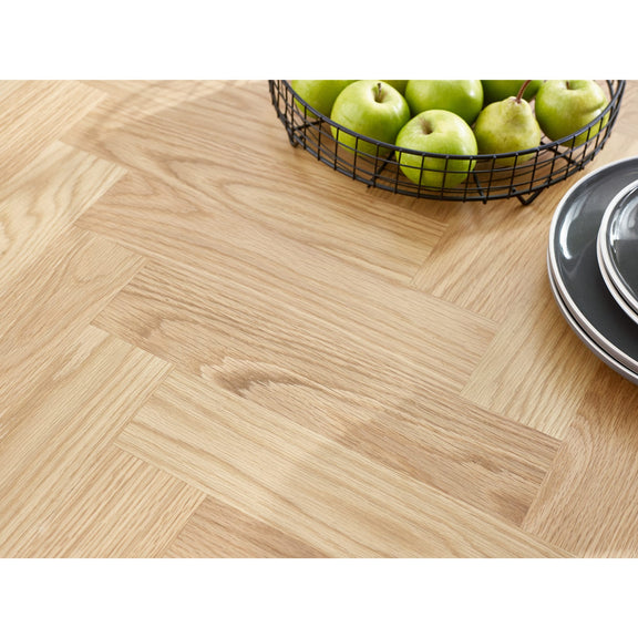 Wooden floor with a basket of apples and plates on a white background
