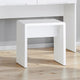 White side table on a wooden floor with a neutral background