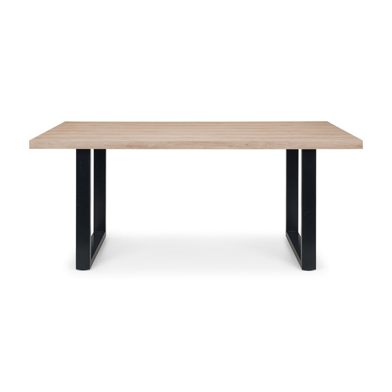 Table with wooden top and black metal legs on a white background