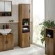Bathroom with wooden cabinets and a sink, featuring a large window.