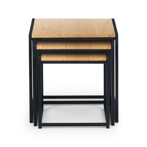 Set of three nesting tables with wooden tops and black metal frames on a white background